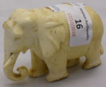 An early 20th century carved ivory elephant