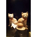 Two Rye Pottery sponge ware seated cats, one monogrammed S.A.L.