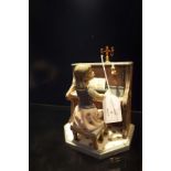 A Lladro figurine of a girl at piano 'Practice makes Perfect', boxed   No chips, cracks or