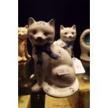 A pair of Rye Pottery cats