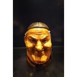 A German Pottery tobacco jar in the form of a friar