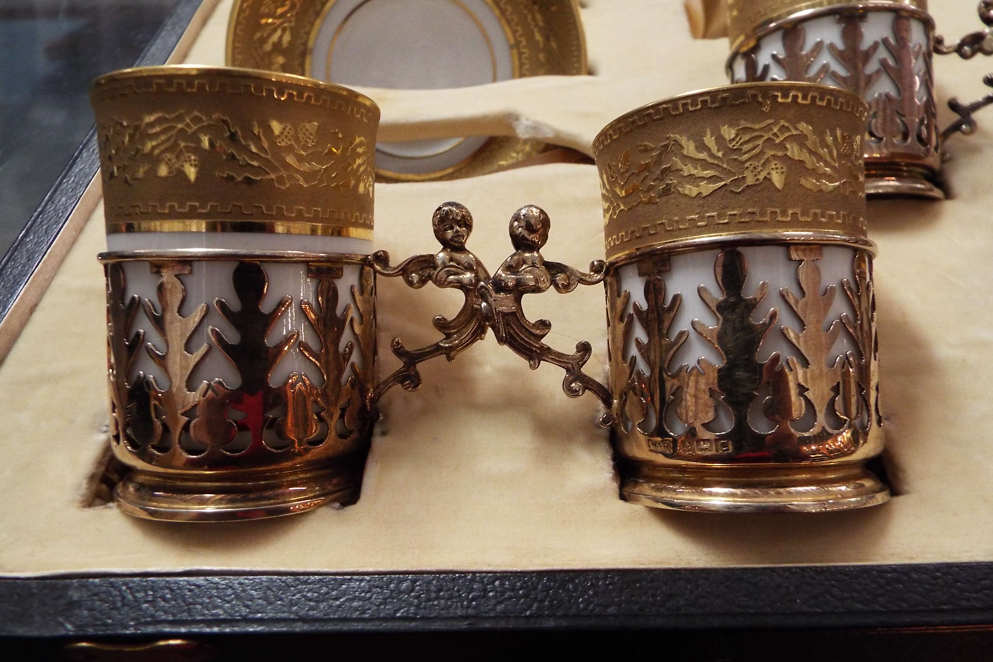 A cased set of Limoges coffee cans and saucers heavily decorated with floral and Greek key gilt - Image 4 of 4