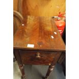 A small Victorian mahogany drop-leaf table fitted with two short drawers and raised on turned