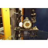 A Continental spelter figural clock depicting performing musicians,