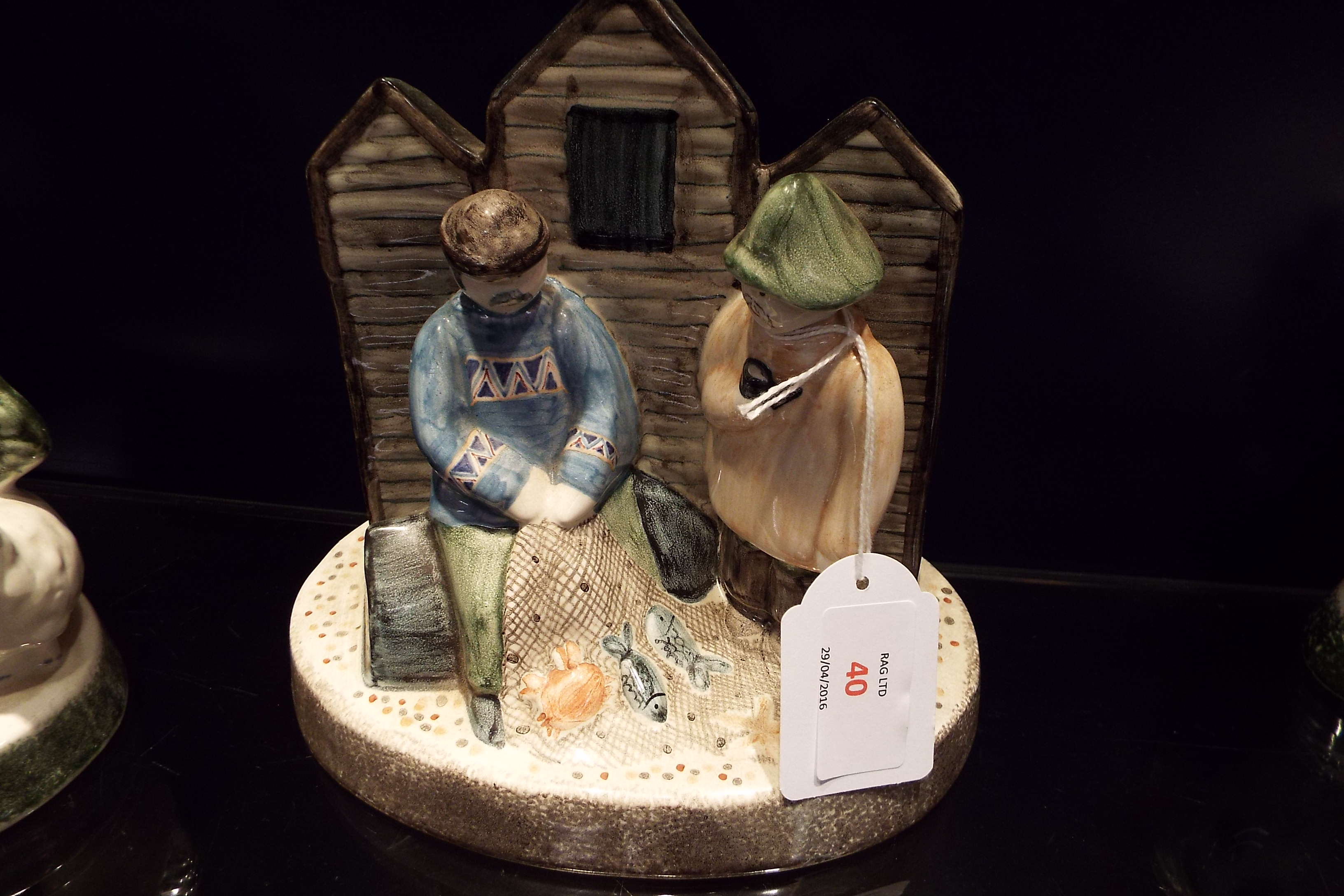 A Rye Pottery figurine 'fisher Folks at Hut'