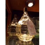 A pair of 1920s/30s French glass scent bottles, one with label 'La Maison du Parc,