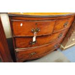 A late Georgian mahogany bow fronted chest of two over two long cock-beaded drawers each with