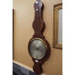 A 19thC inlaid mahogany cased wheel barometer, the silvered dial inscribed 'Lione, 14 Brook Street,