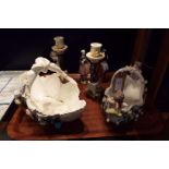 Two Continental porcelain baskets having cherub and floral decoration with a pair of china