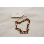 A Victorian 9ct rose gold curb chain bracelet set with seed pearls and turquoise cabochons,