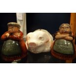 A Belleek piggy bank decorated with shamrock together with a Royal Doulton figural salt and pepper