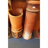 Two antique terracotta chimney pots