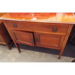 An Edwardian mahogany chequer strung wash stand fitted with a single frieze drawer above a pair of