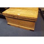 A Victorian pine chest with metal handles