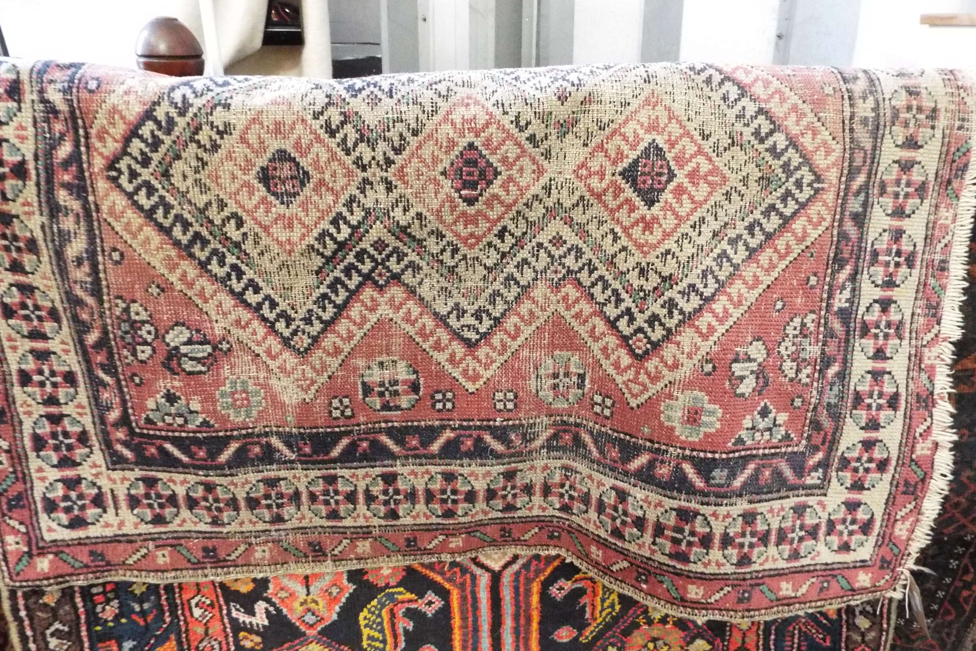 A beige ground Kurdish style rug 104 cm x 93 cm