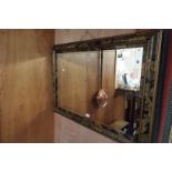 A large bevelled glass mirror set in an oak and acorn painted frame Modern transfer