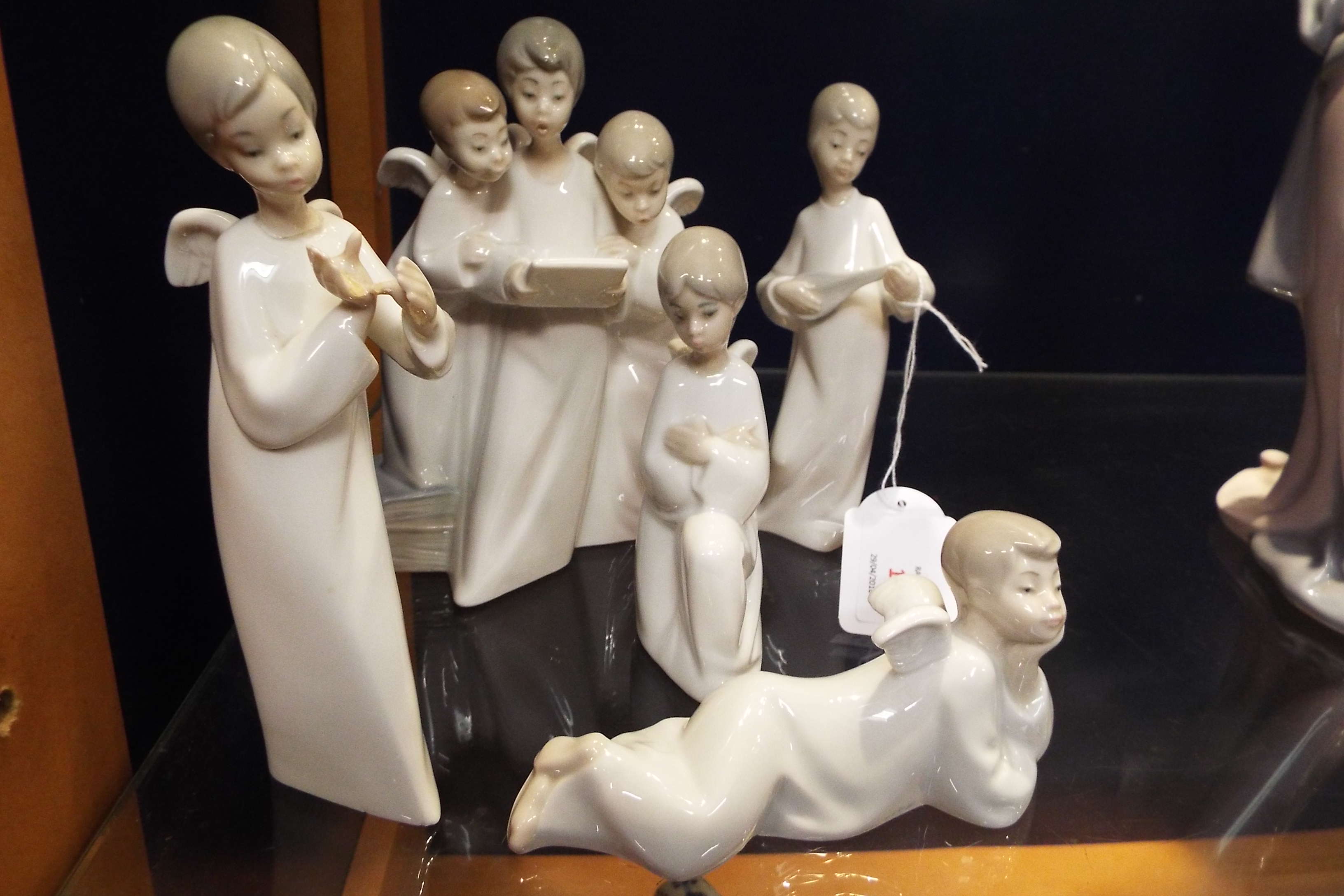 A group of five Nao figurines of an 'Angel Choir'