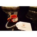 A Rye Pottery miniature uranium glazed squat jug,