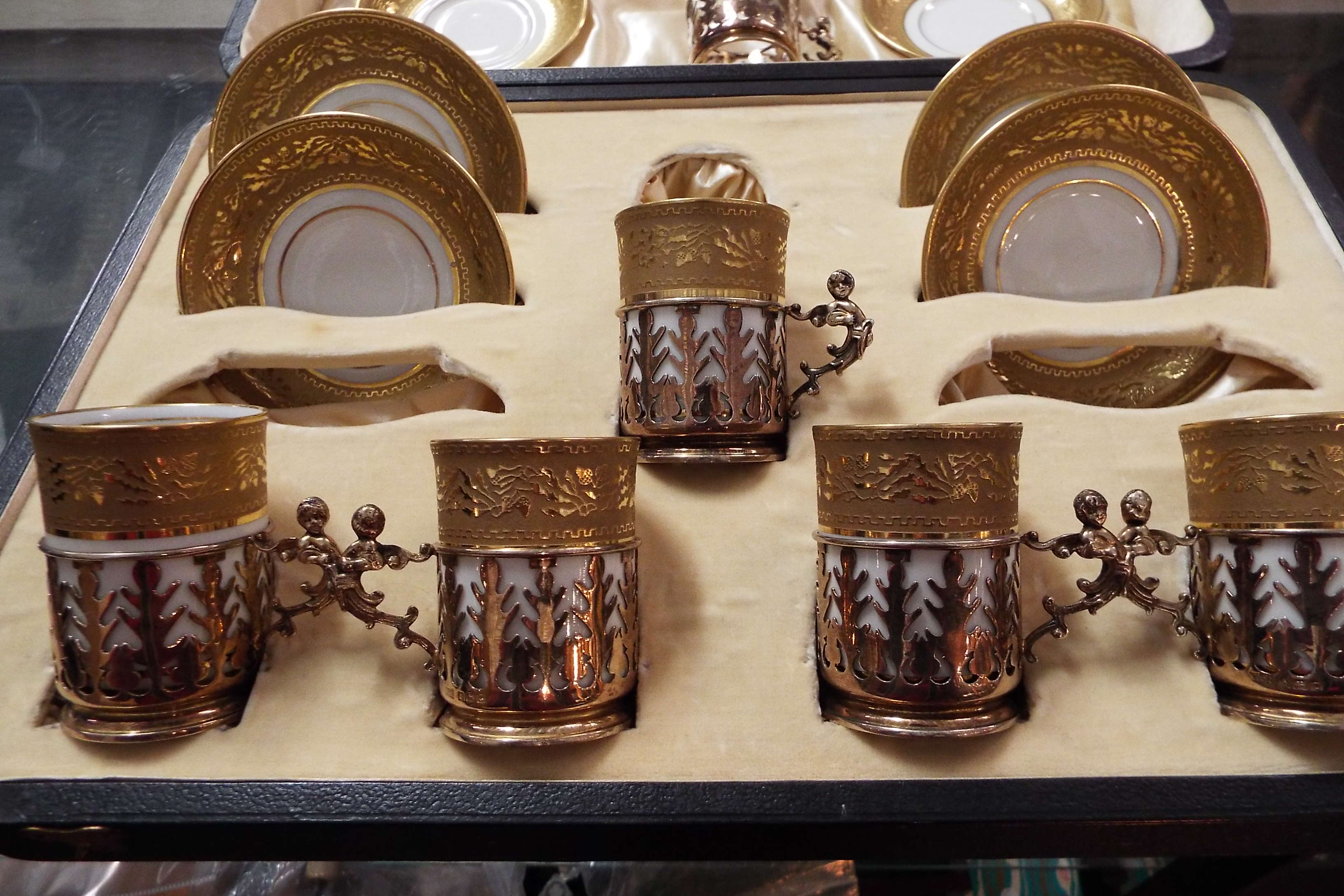 A cased set of Limoges coffee cans and saucers heavily decorated with floral and Greek key gilt - Image 2 of 4