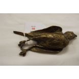 A Victoria brass figure of a deceased sparrow