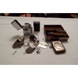 A selection of items to include a silver ingot pendant dated London 1977,