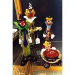 A selection of four Murano style glass clowns