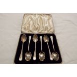A set of cased silver tea-spoons with gadrooned borders dated Sheffield 1965