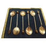 A cased set of silver coffee bean spoons dated Birmingham 1929