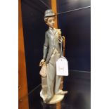 A Lladro figurine 'Charlie Chaplin' 'The Little Tramp',