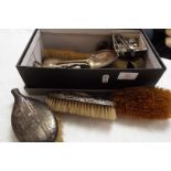 A mixed selection of silver and silver-plated ware to include spoons, brushes,