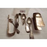 A mixed selection of silver to include tongs and spoons weighing 6.