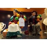 Two Royal Doulton figurines 'The Balloon Man', HN 1954 and 'The Old Balloon Seller',