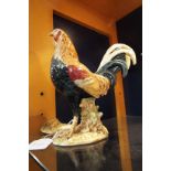 A Beswick figure of a 'Gamecock' no 2059 Two tail feathers broken off one in two