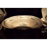 A tin glazed barber's bowl with stylised decoration