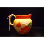 A Clarice Cliff 'Perth' shape jug in the 'Red Roofs' pattern c1931 restored to rim