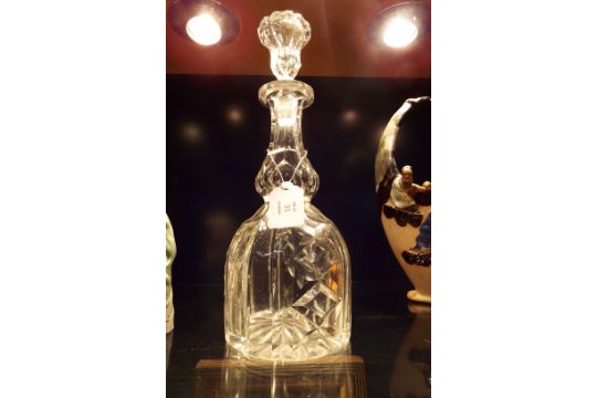 A good quality facet cut glass decanter