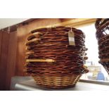 Nine wicker and wooden handled shallow bowls as new