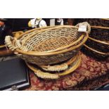 A group of four wicker shallow baskets as new