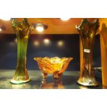 A pair of copper lustre carnival glass vases and a fruit bowl