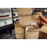 A set of three wicker bathroom baskets as new