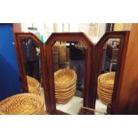 A mahogany framed triple aspect mirror