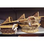 Three wicker baskets and a letter rack as new