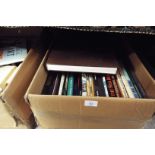 A box of assorted reference books