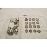 A selection of pre-1947 one shilling coins