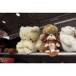 A selection of assorted cuddly toys to include bear, owl,