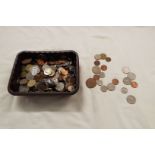 A mixed selection of coinage to include one penny pieces, three penny pieces, one shillings,