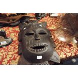 A large carved African mask