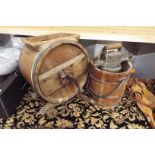 An antique wooden butter churn and an ice cream maker