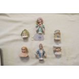 A selection of porcelain pin doll heads