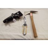 A fireman's axe with leather scabbard along with a pair of bone handled Solingen secateurs
